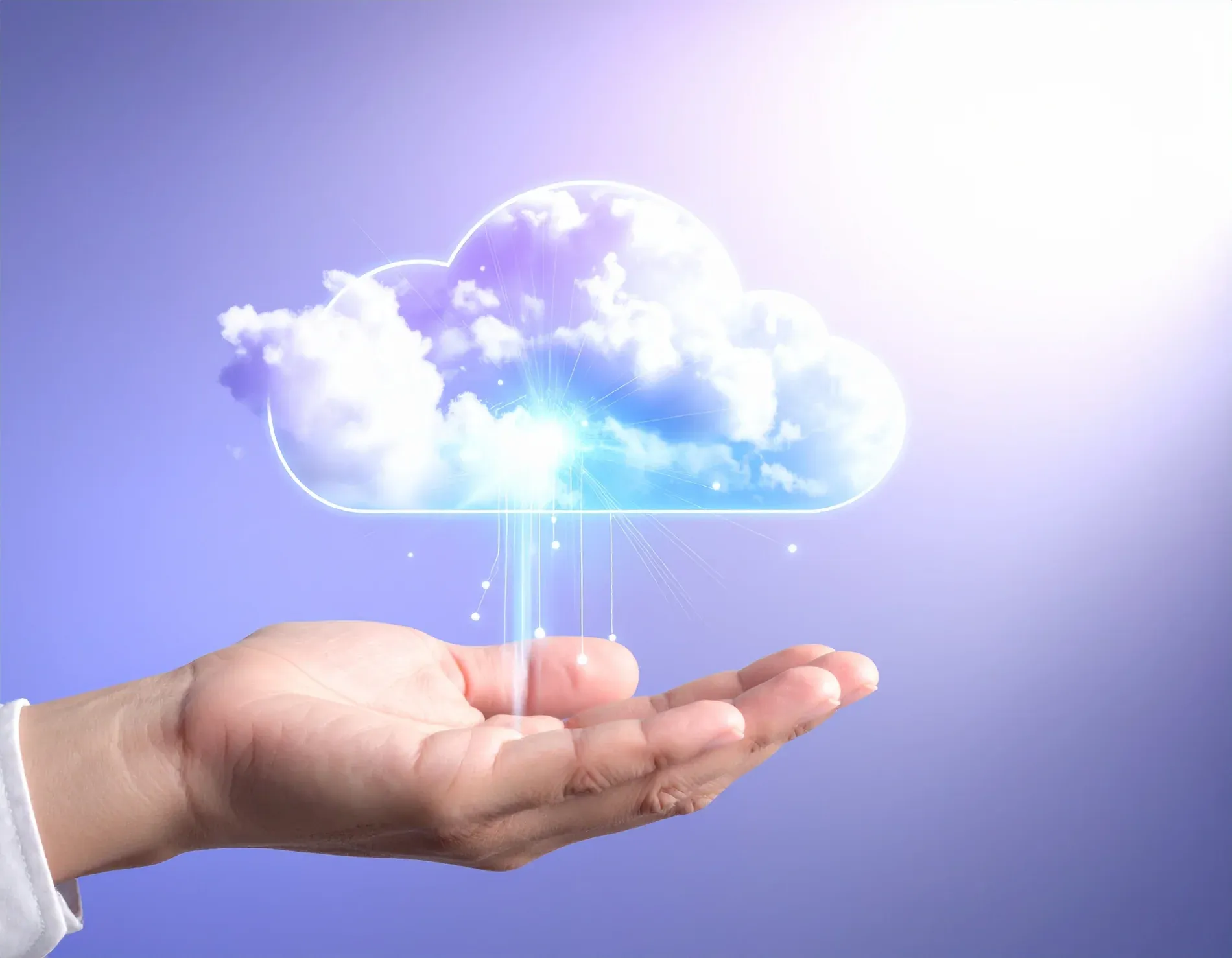 A glowing cloud with data streams hovering above an open hand